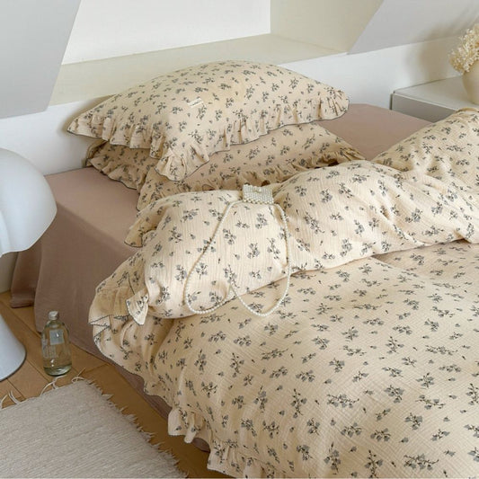 Full view of the floral bedding set with ruffle duvet cover set and matching shams.