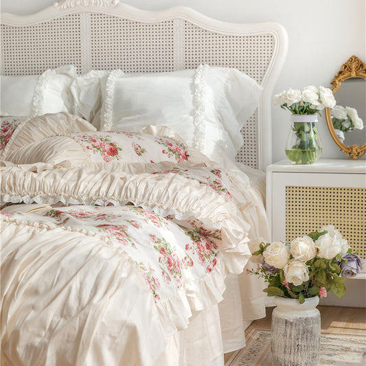 Floral cotton bedding set with ruffles and bed skirt in a romantic bedroom setting