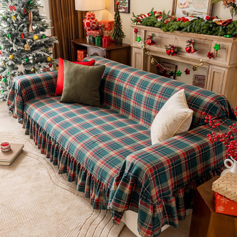 Green tartan plaid Christmas sofa cover with ruffles, festive living room decor