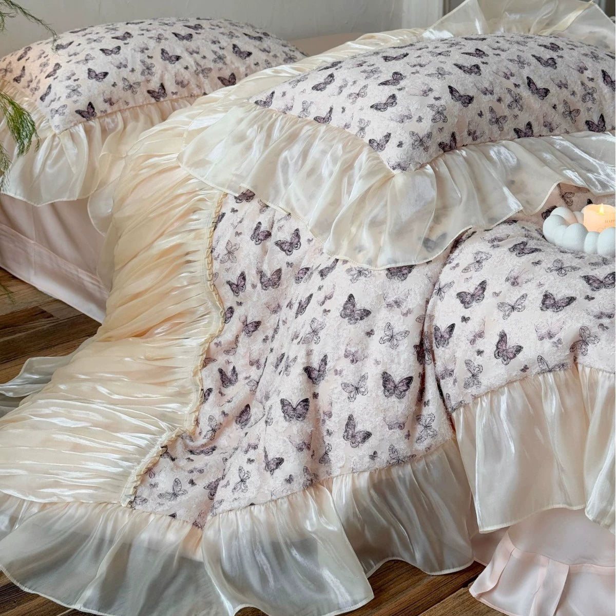 Medium shot of Butterfly print bedding with thick, elegant ruffled edge.