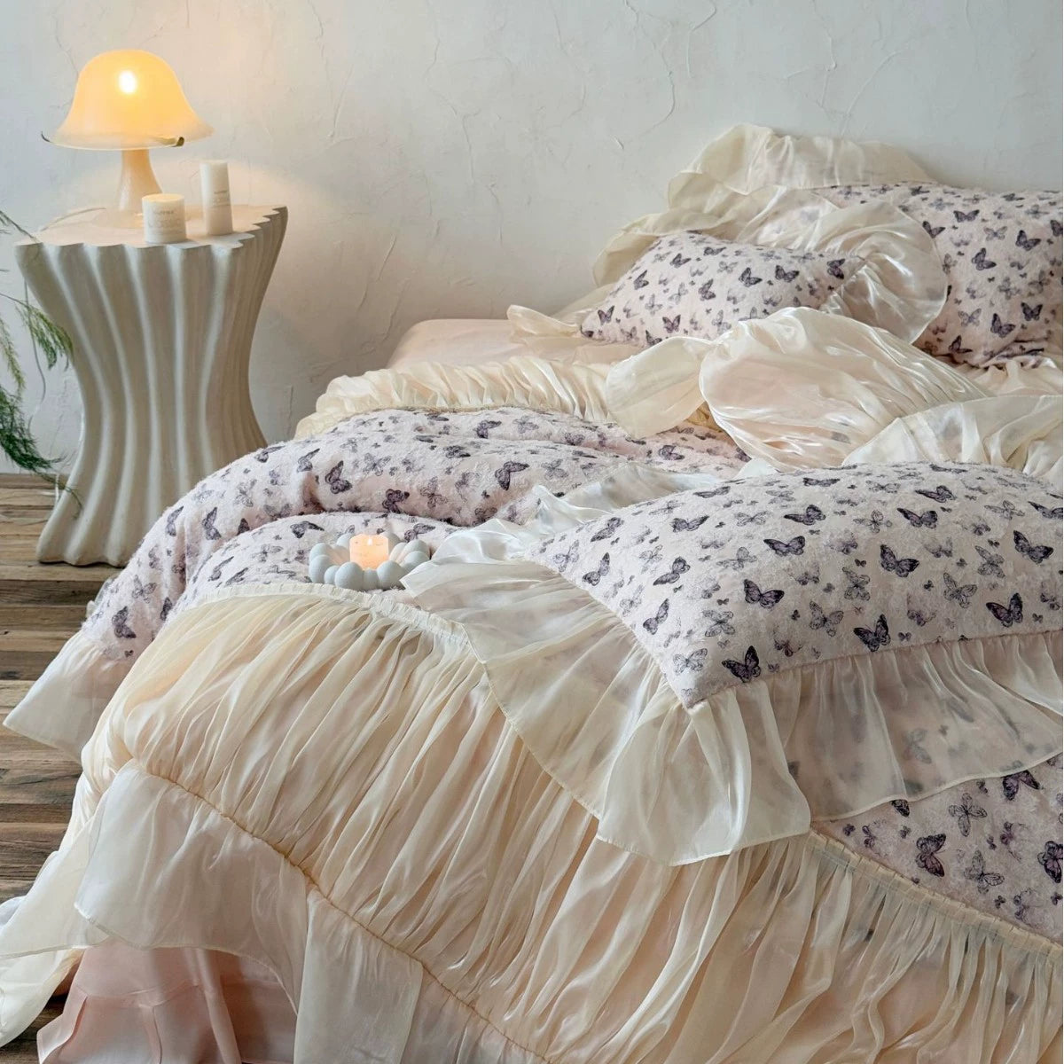Full view of Ruffled Butterfly Bedding set in warm, cozy lighting.