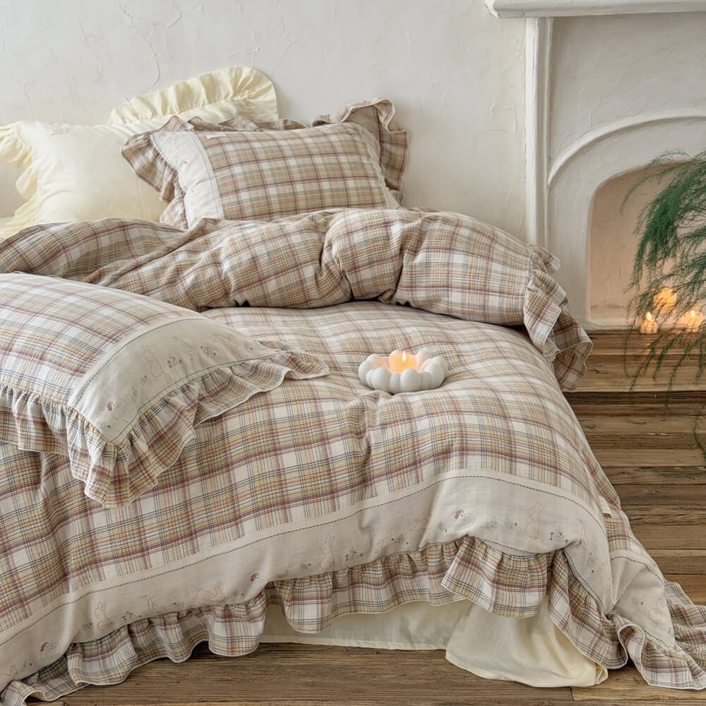 Beige plaid ruffle bedding set on a modern bed, cotton muslin fabric with soft ruffles