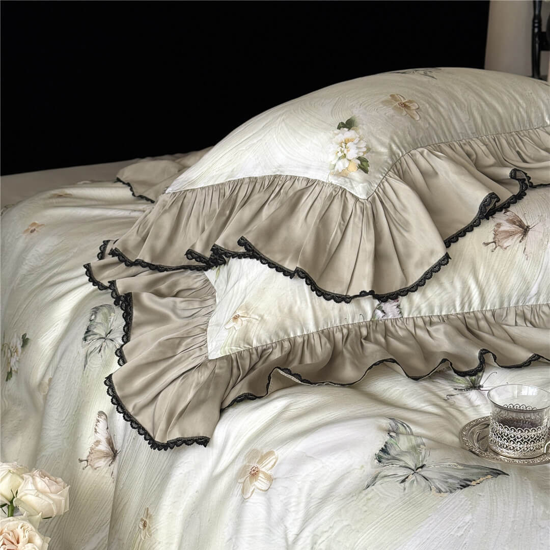 Close-up stack of pillowcase from the Soft TENCEL™ Duvet Cover Set, highlighting the soft fabric and the layering of the ruffled edges.