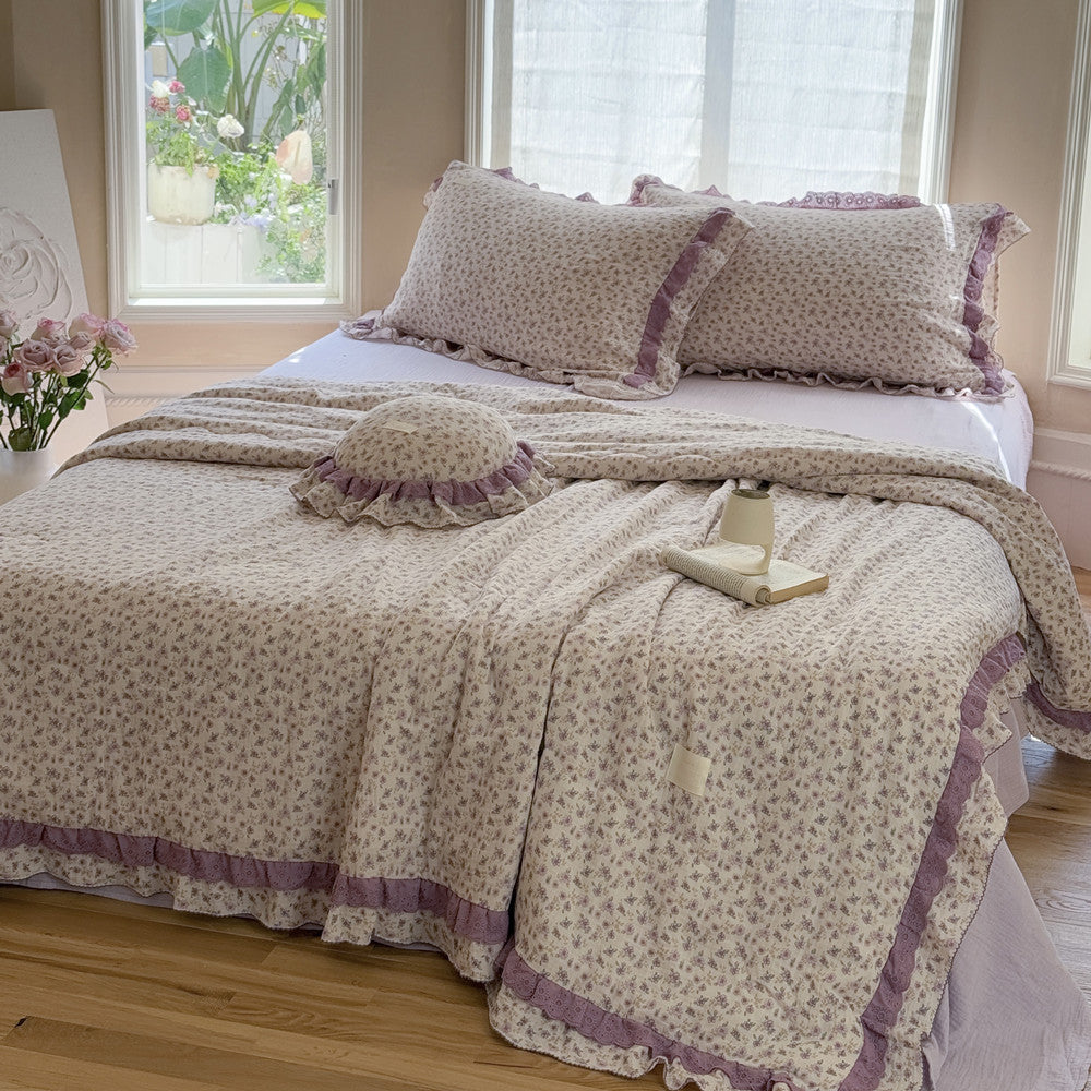 Cozy bedroom with breathable cotton vintage lilac floral comforter in soft purple tones