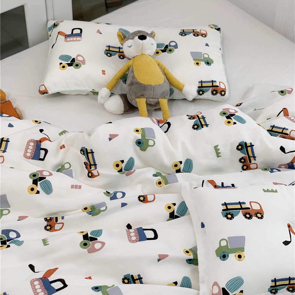 Twin size Bamboo Duvet Cover and pillow shams with a colorful truck and construction vehicle pattern.