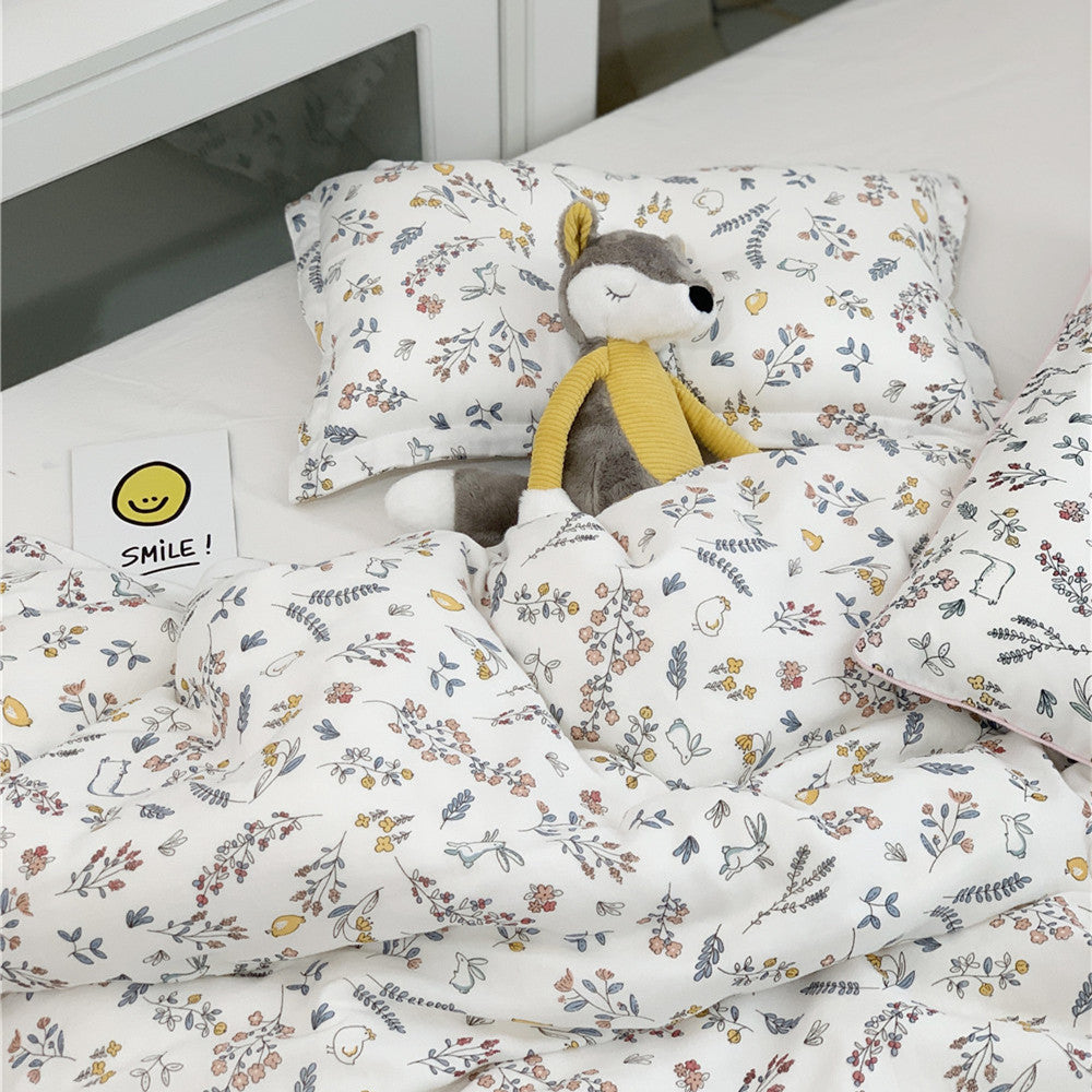 Twin Size Bedding set featuring a gentle floral and rabbit pattern on the soft bamboo duvet cover.