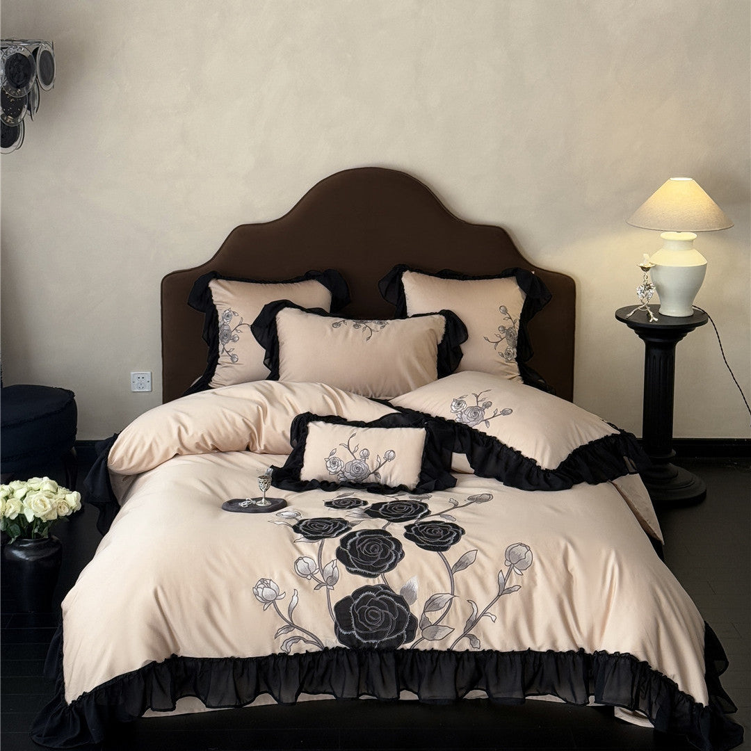 Black rose duvet cover set in warm taupe with full pillows