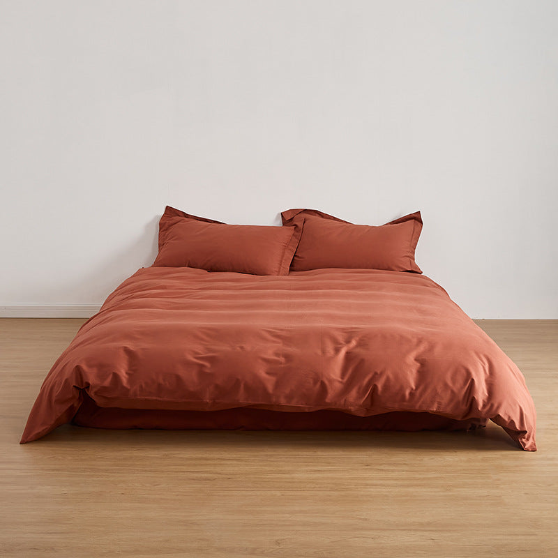 Full view of a Rust-colored Brushed Cotton Duvet Cover Set on a bed, showcasing the Soft & Cozy Bedding.