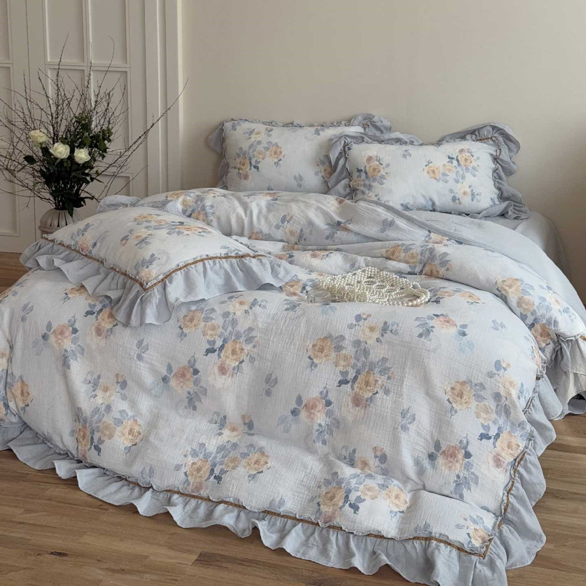 Soft cotton gauze fabric close-up with floral print