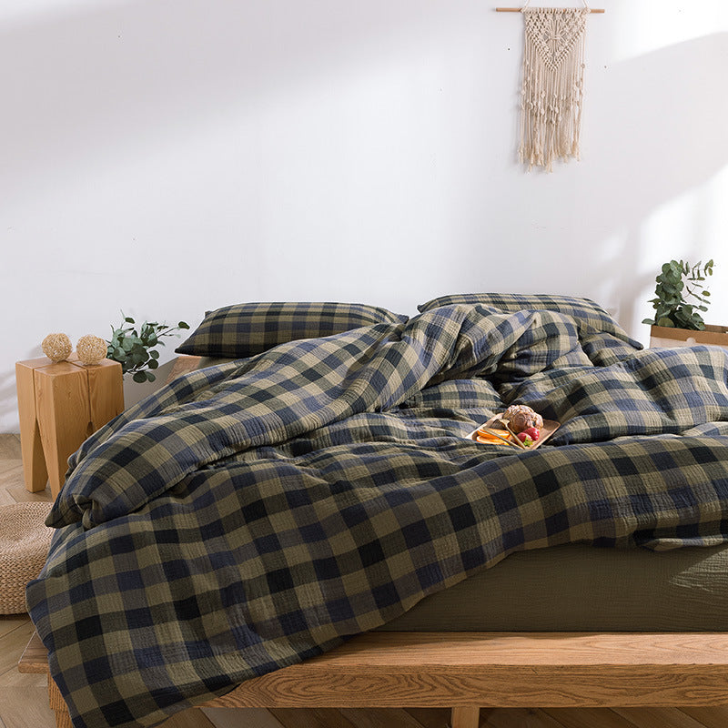 Cozy green plaid bedding set styled with pillowcases