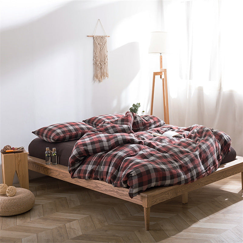 Red coffee plaid bedding set on minimalist bed