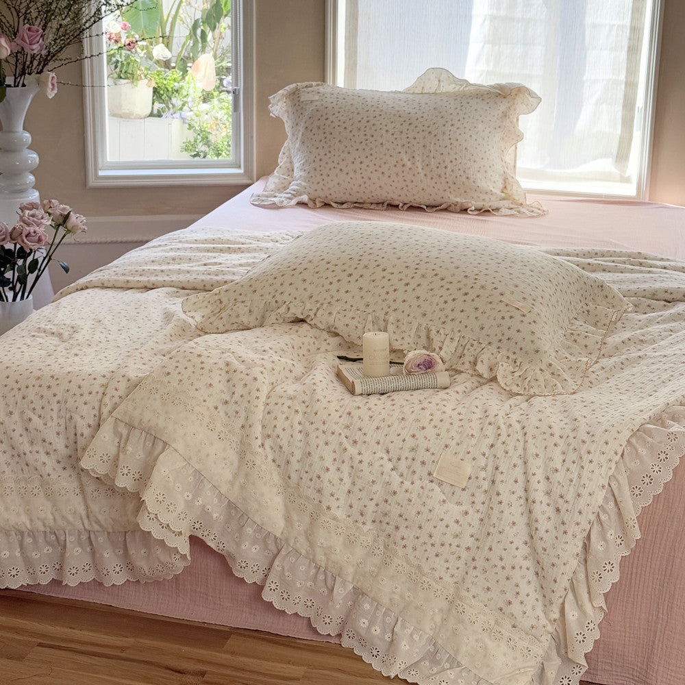 Soft floral cotton comforter close-up texture