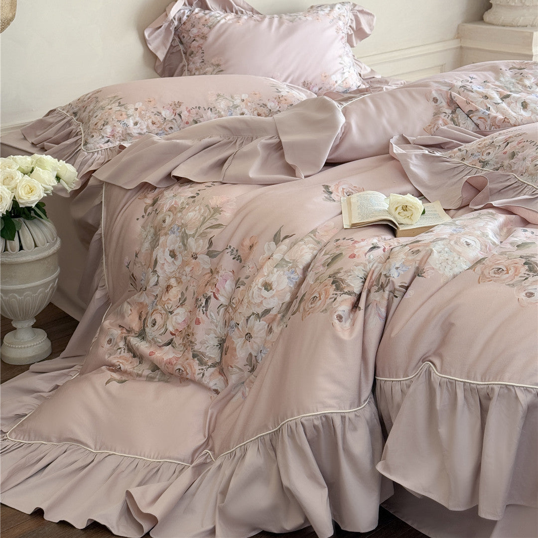 Ruffled pillow with floral print in blush color