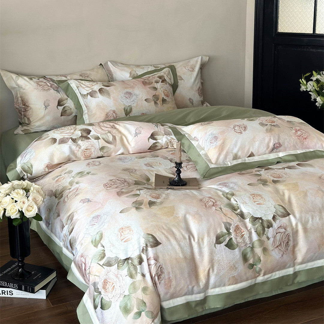 Side angle view of green floral duvet cover with matching shams
