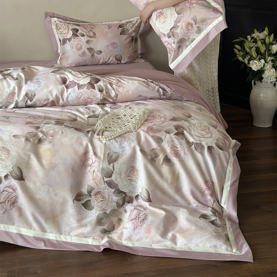 Angled side view of pink rose floral bedding set