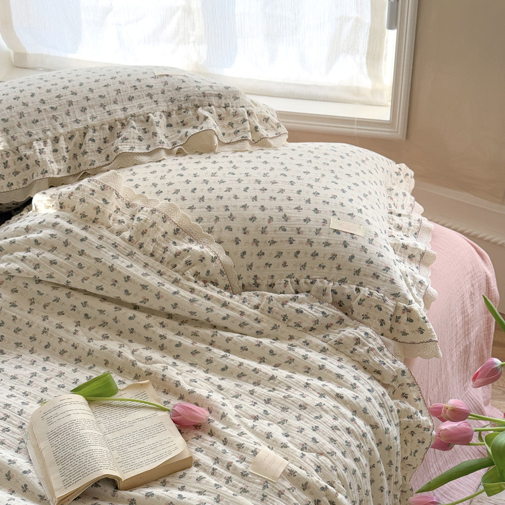 Lightweight summer cotton quilt with pink floral detail