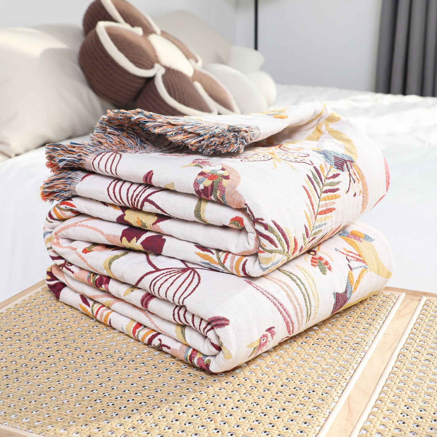 Folded cotton jacquard throw blanket with wild floral design