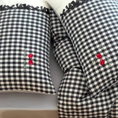 Black and white gingham cotton bedding set with cherry embroidery and black ribbon trim pillowcases