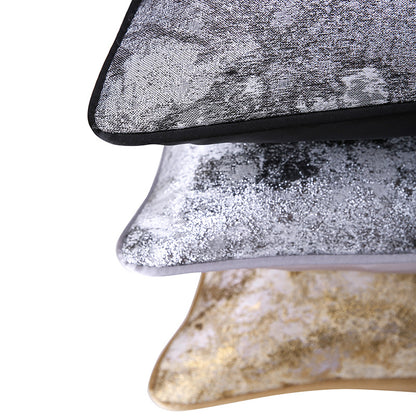Stack of abstract textured decorative pillow covers in silver and gold from StuffedHome