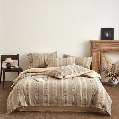 Boho cotton jacquard bedding set with beige and green geometric pattern in cozy bedroom
