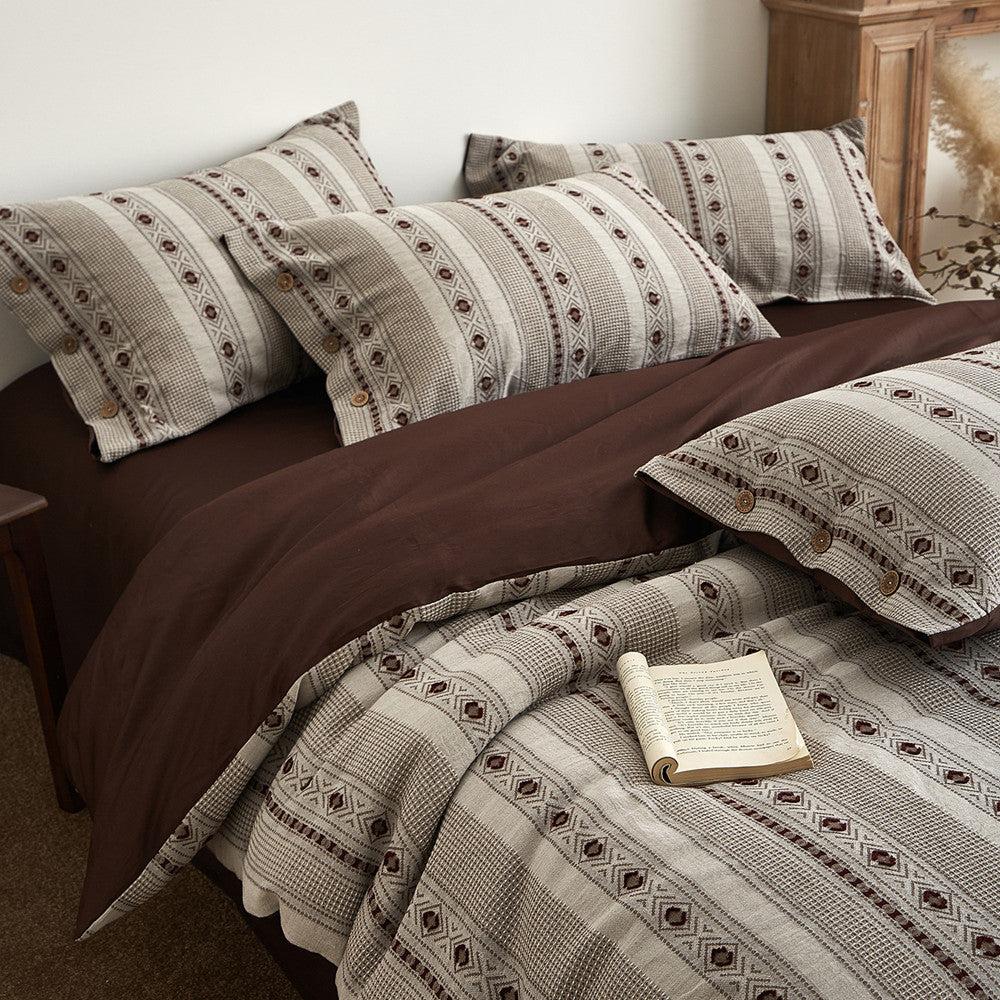 Boho cotton jacquard bedding set with striped geometric patterns and wooden button accents