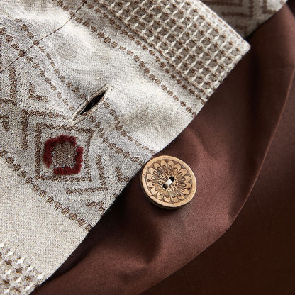 Boho cotton jacquard bedding with geometric embroidery and a decorative wooden button