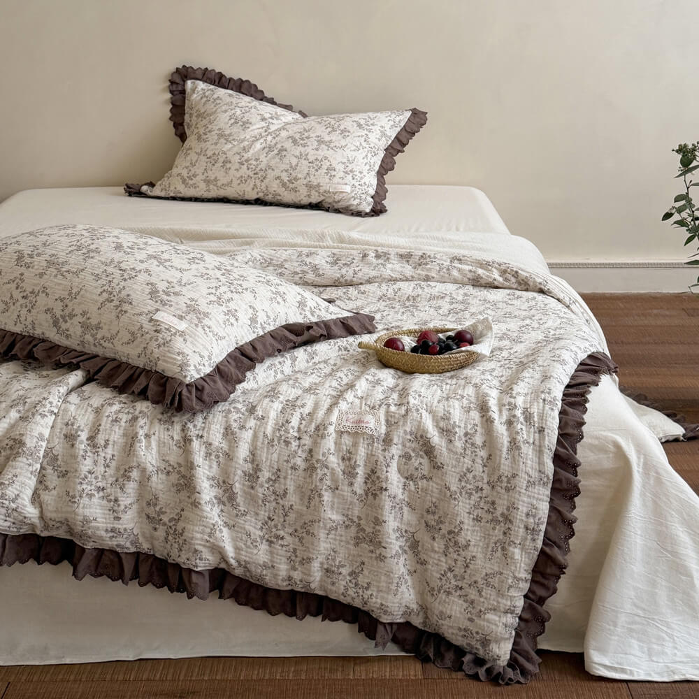 Brown floral cotton comforter with ruffled lace trim for vintage cottage bedding