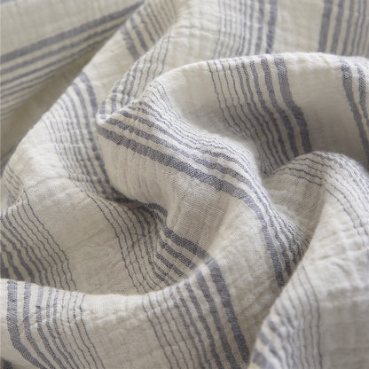 Extreme close-up of the Smoky Gray Stripe 100% cotton gauze fabric, detailing the woven gray and white stripes and soft texture.