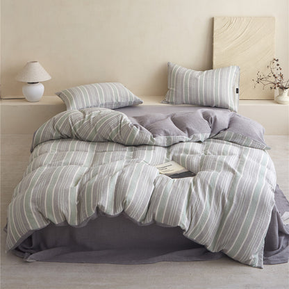 Full view of the Grey & Pale Green Striped Cotton Gauze Bedding Set, showing the duvet cover, shams, and the solid coordinating sheet.
