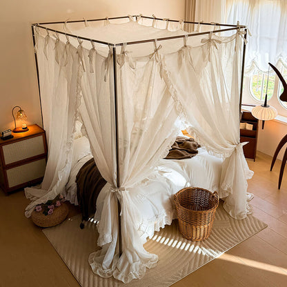 Bed with a canopy in a bedroom setting
