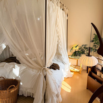 Bedroom with a canopy bed and decorative elements