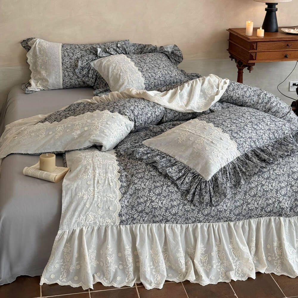 Romantic gray floral bedding set with ivory embroidery and layered ruffled pillows