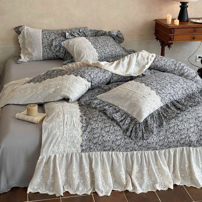 Romantic gray floral bedding set with ivory embroidery and layered ruffled pillows