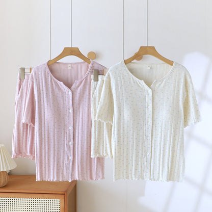 Cotton short sleeve pajama sets in pink and cream with ditsy floral pattern on hangers