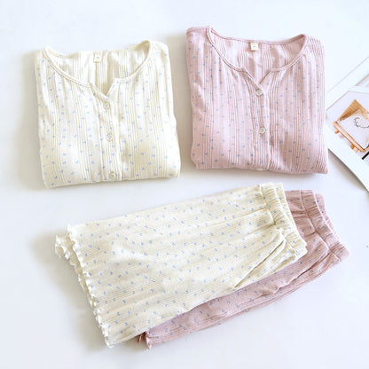 Folded ditsy floral cotton short sleeve pajama sets in cream and pink on white background