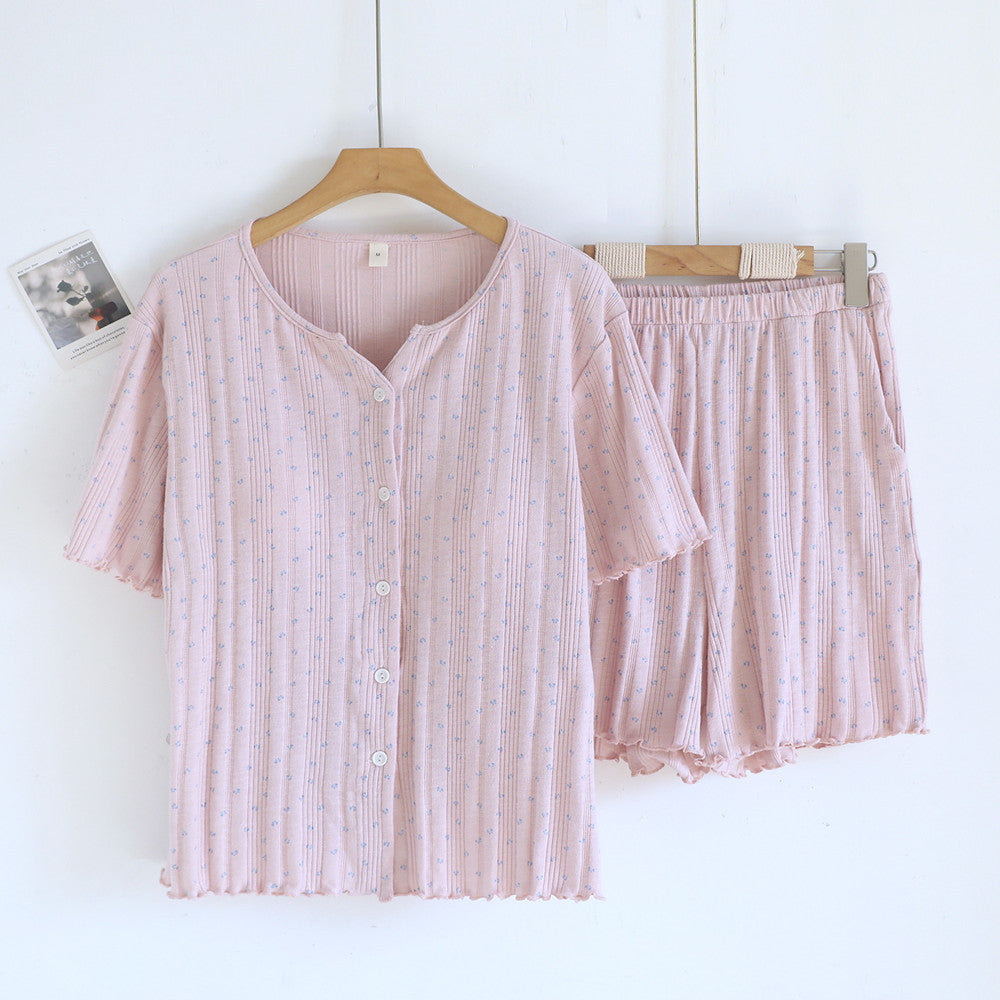 Light pink ditsy floral cotton short sleeve pajama set with button-up top and shorts