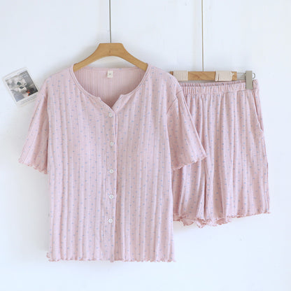 Light pink ditsy floral cotton short sleeve pajama set with button-up top and shorts