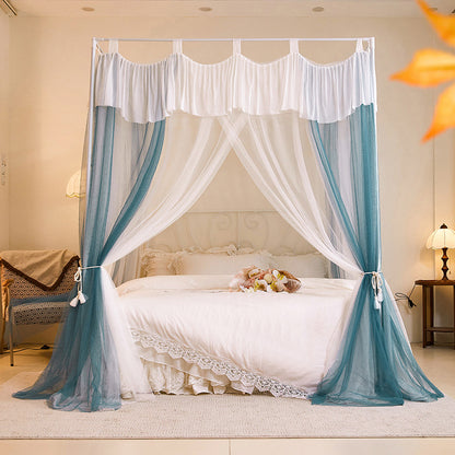 Elegant canopy bed with blue and white curtains, lace bedding, cozy bedroom decor
