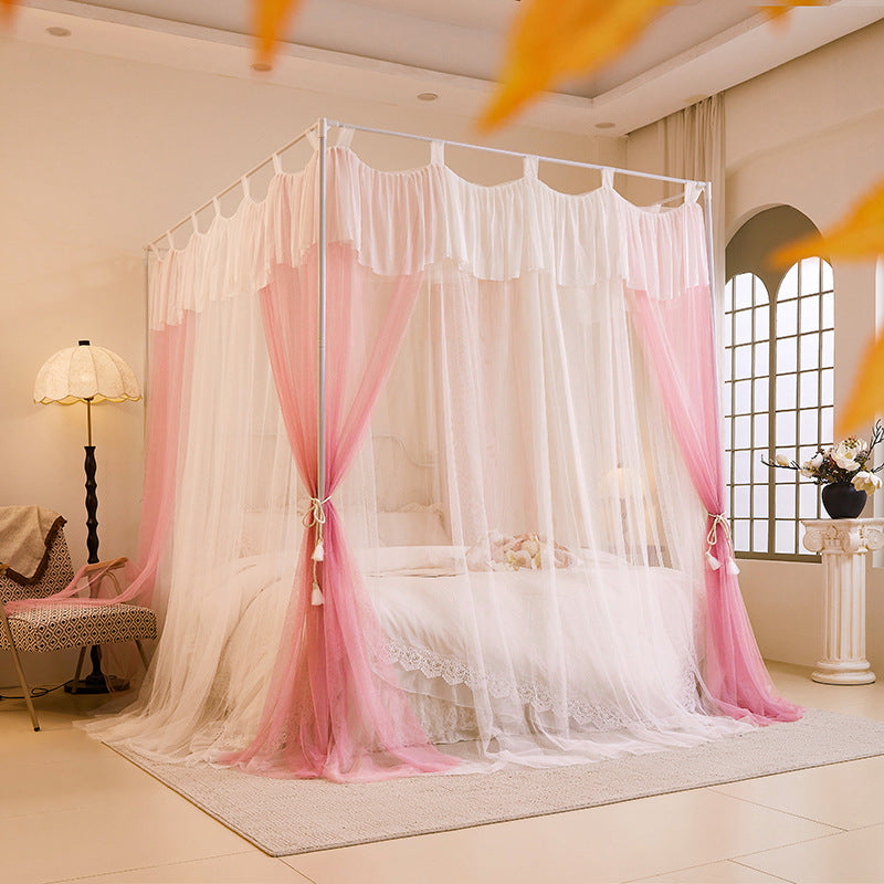 Elegant pink and white canopy bed curtains in a bright, cozy bedroom with luxury bedding