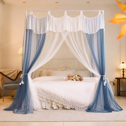 Elegant canopy bed with white and blue curtains, cotton bedding, cozy bedroom decor
