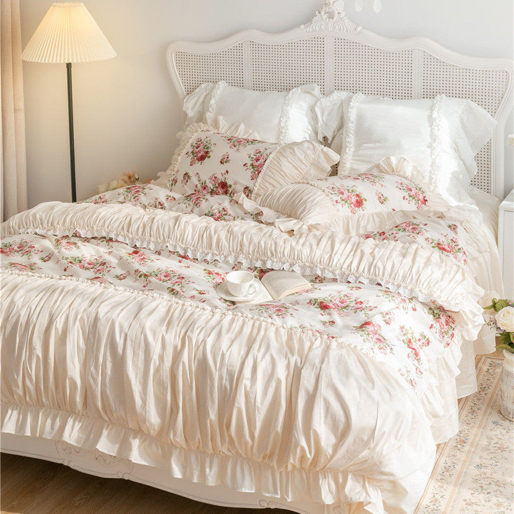 Floral cotton bedding set with ruffles and bed skirt on a cozy, elegant bedroom setup.