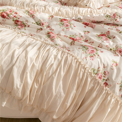 Floral cotton bedding set with ruffles and bed skirt in soft, romantic colors