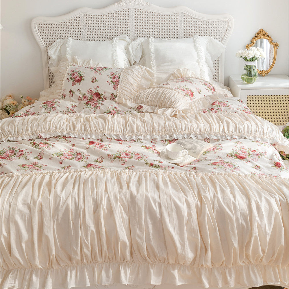 Floral cotton bedding set with ruffles and bed skirt in a cozy, romantic bedroom setting
