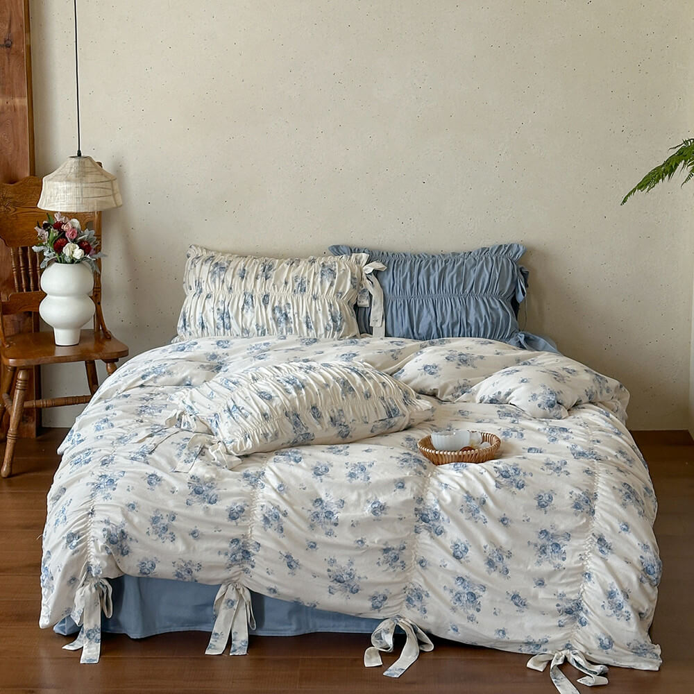 French cottage blue floral cotton muslin bedding set with gathered pillow shams and dusty blue sheet