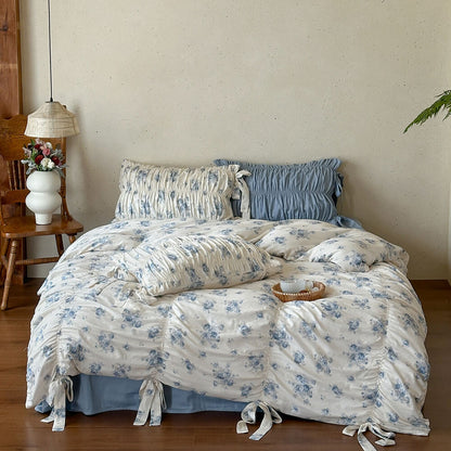 French cottage blue floral cotton muslin bedding set with gathered pillow shams and dusty blue sheet