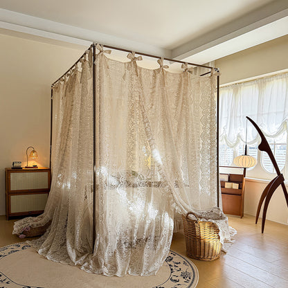 Elegant lace canopy curtains draped over a four-poster bed in a cozy sunlit bedroom