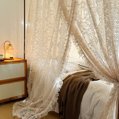 Romantic lace canopy curtains for four-poster bed with cozy bedding and bedside table