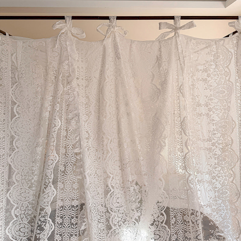 Sheer white lace bed canopy curtains with floral patterns and tie top for four poster beds