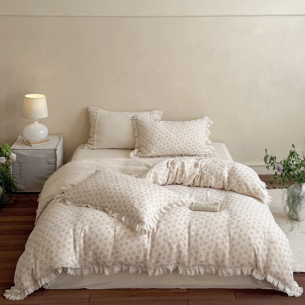 Complete wide shot of the romantic French country style dusty pink floral bedding set on a queen bed, creating a cozy and aesthetic bedroom retreat.