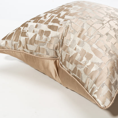 Modern metallic decorative pillow cover with abstract geometric pattern in champagne gold